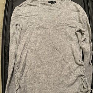 Aqua cashmere sweater with lace tie outs